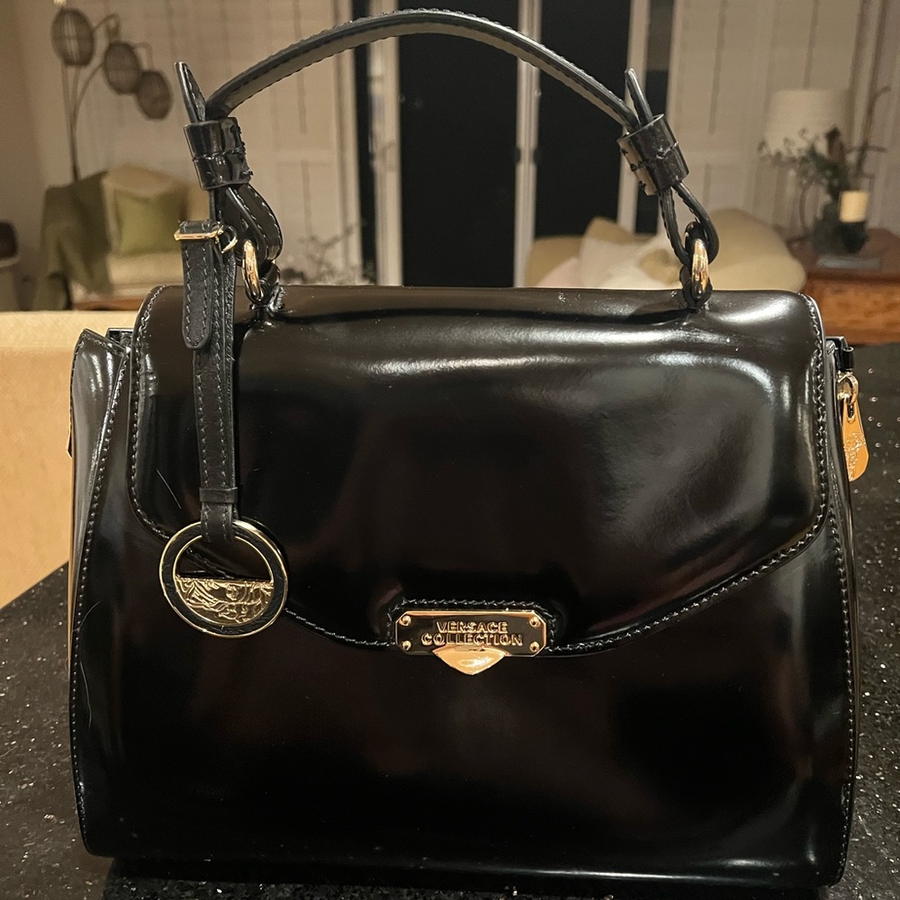 Immaculate Versace Black Handbag with COA